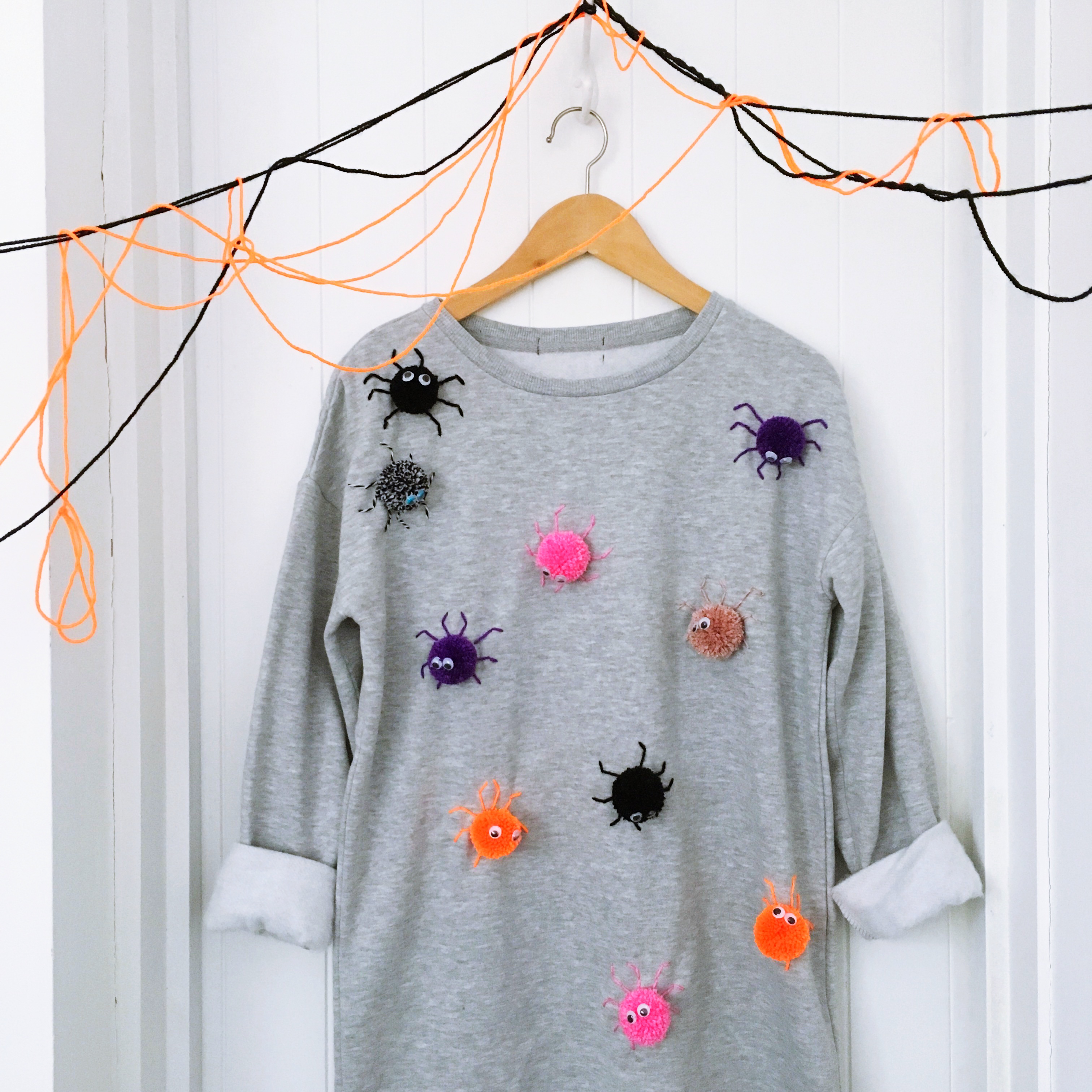 Spooky pompom sweater