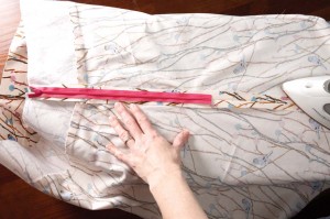 use iron to press open seam allowance below the zip