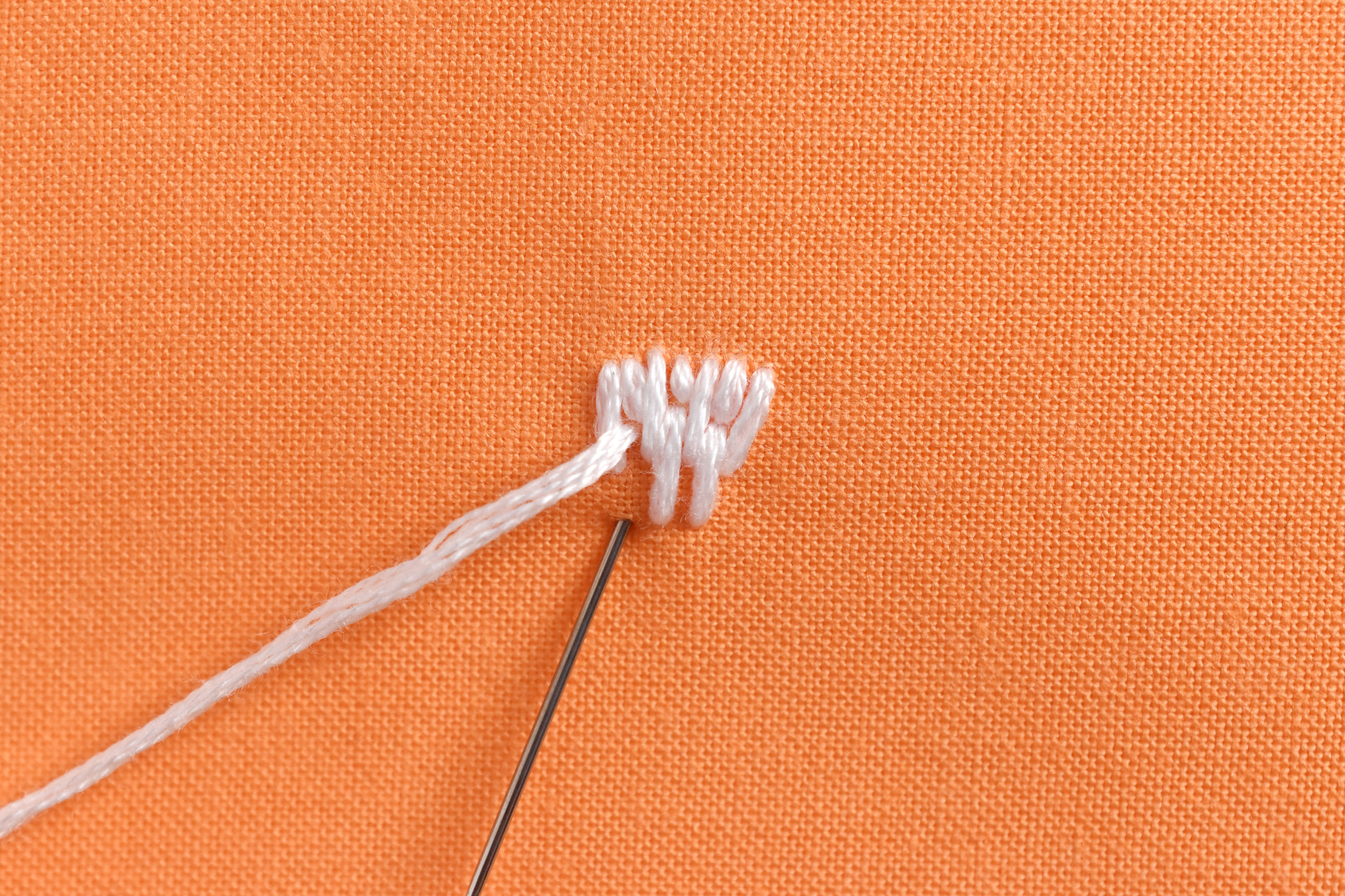 long and short stitches layered on top of each other