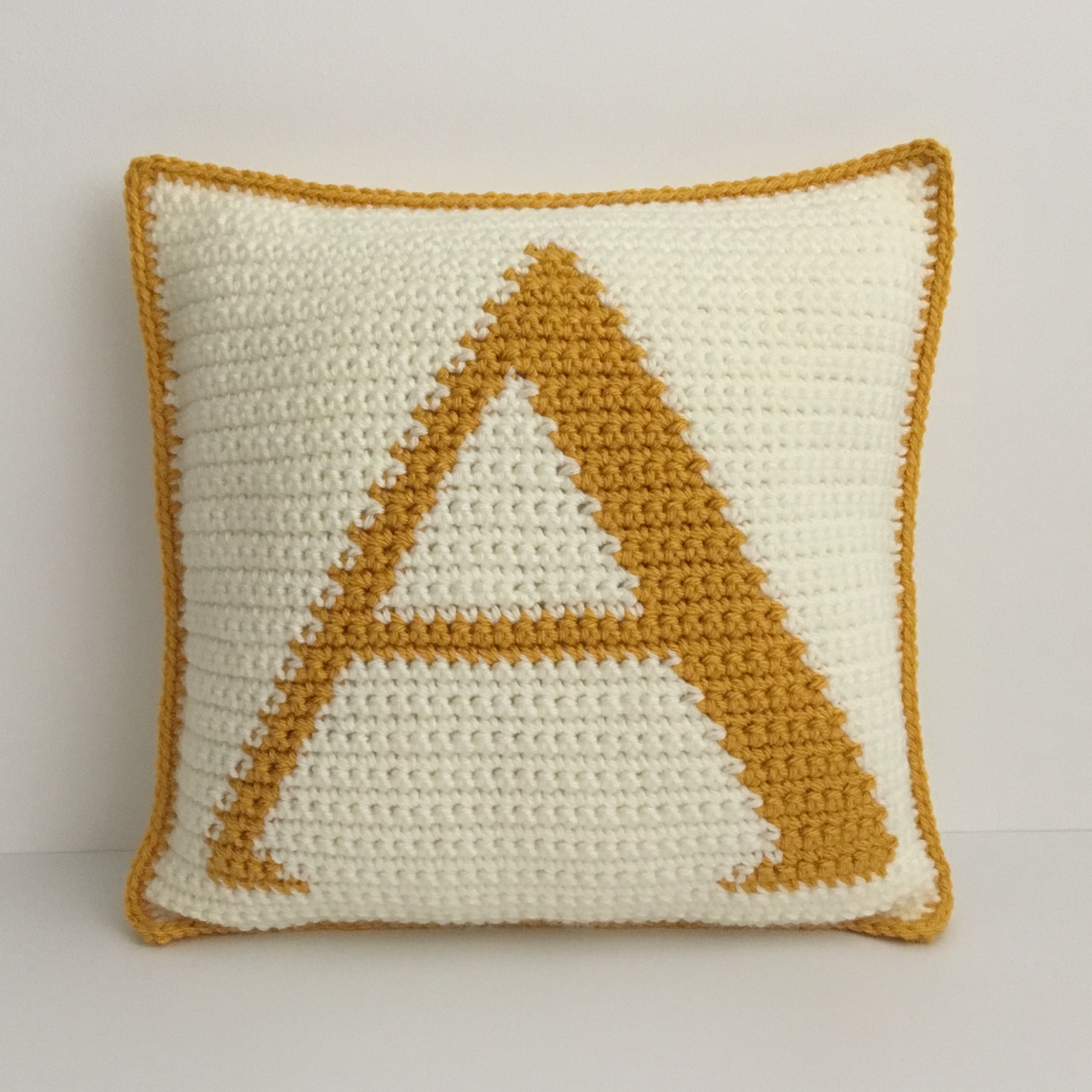 Learn how to crochet intarsia Alphabet Cushions