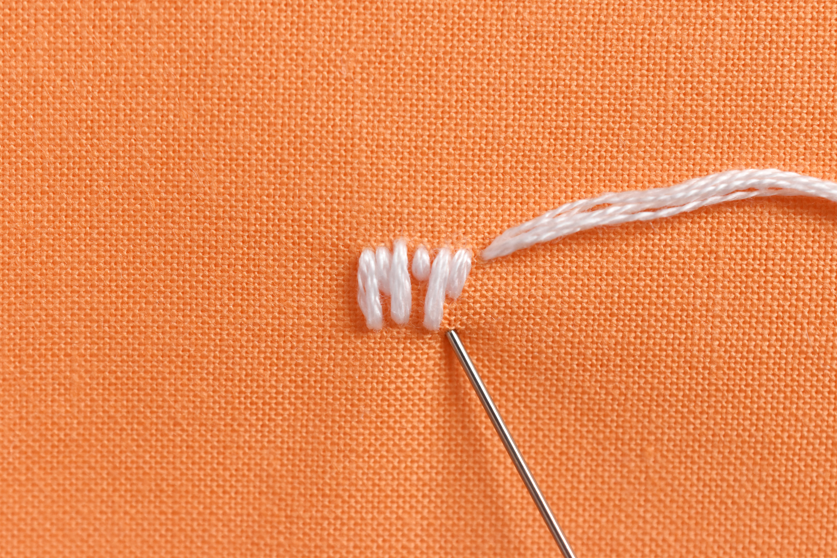 different length stitches to create long and short stitches
