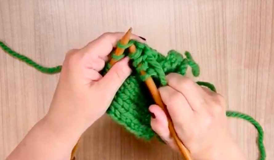 slip the first stitch off left needle then the second