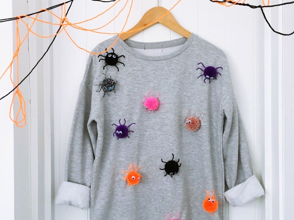 Spooky pompom sweater