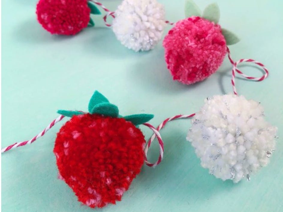 Make a strawberries & cream pom pom garland
