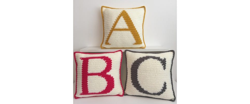 Learn how to crochet intarsia Alphabet Cushions with Chloe Bailey