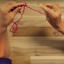 how to purl: insert needle through loop in the front