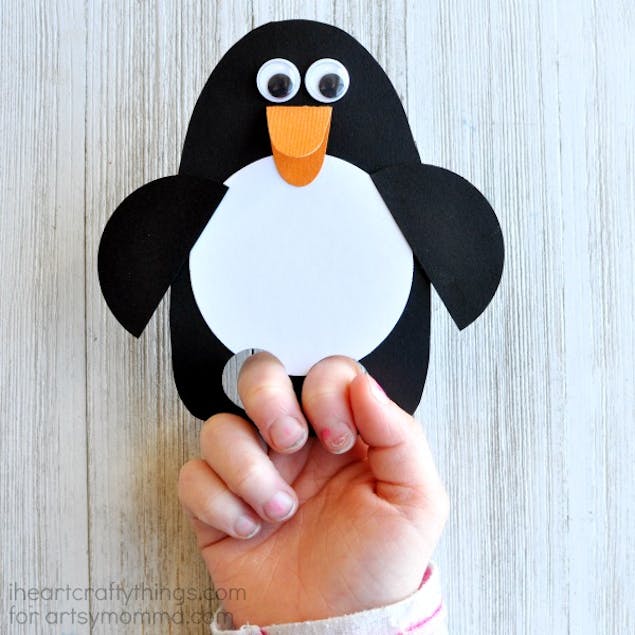 Finger puppet penguin made out of paper