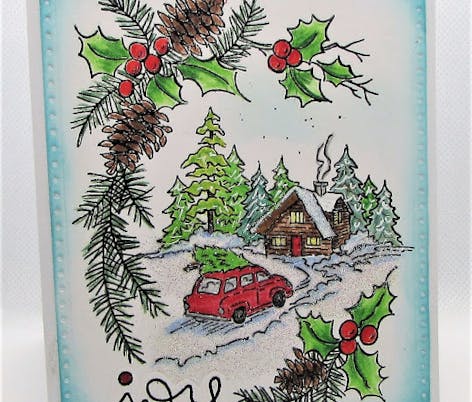 Christmas card with stamped winter cabin and car driving up to the house