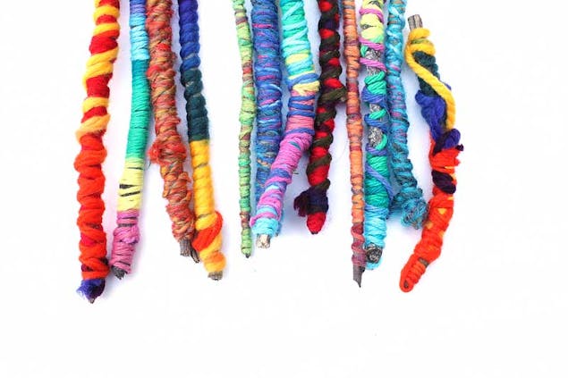 colourful yarn wrapped sticks