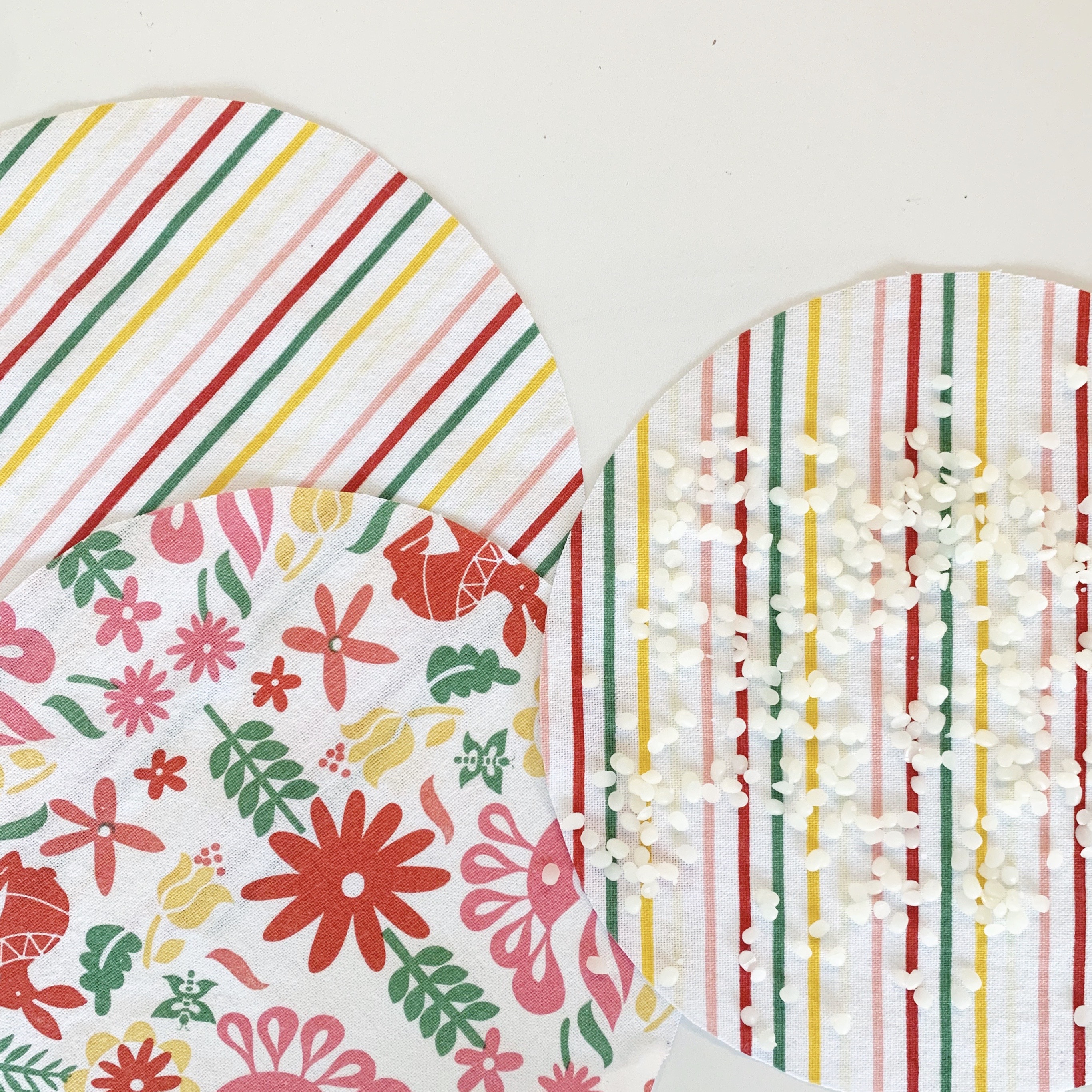 distribute beeswax pellets across fabric