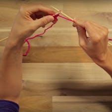 how to purl: slip the loop off the needle