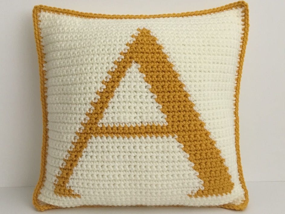 Learn how to crochet intarsia Alphabet Cushions