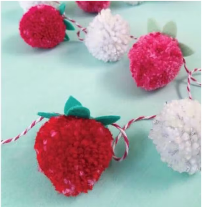 Make a strawberries & cream pom pom garland