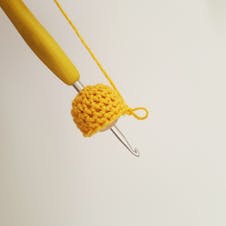crochet sphere covers most area of the bead