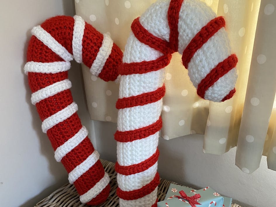 Learn how to crochet the sweetest giant candy cane!