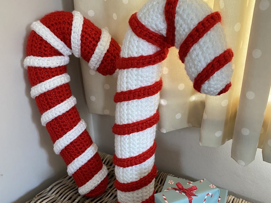 Learn how to crochet the sweetest giant candy cane!