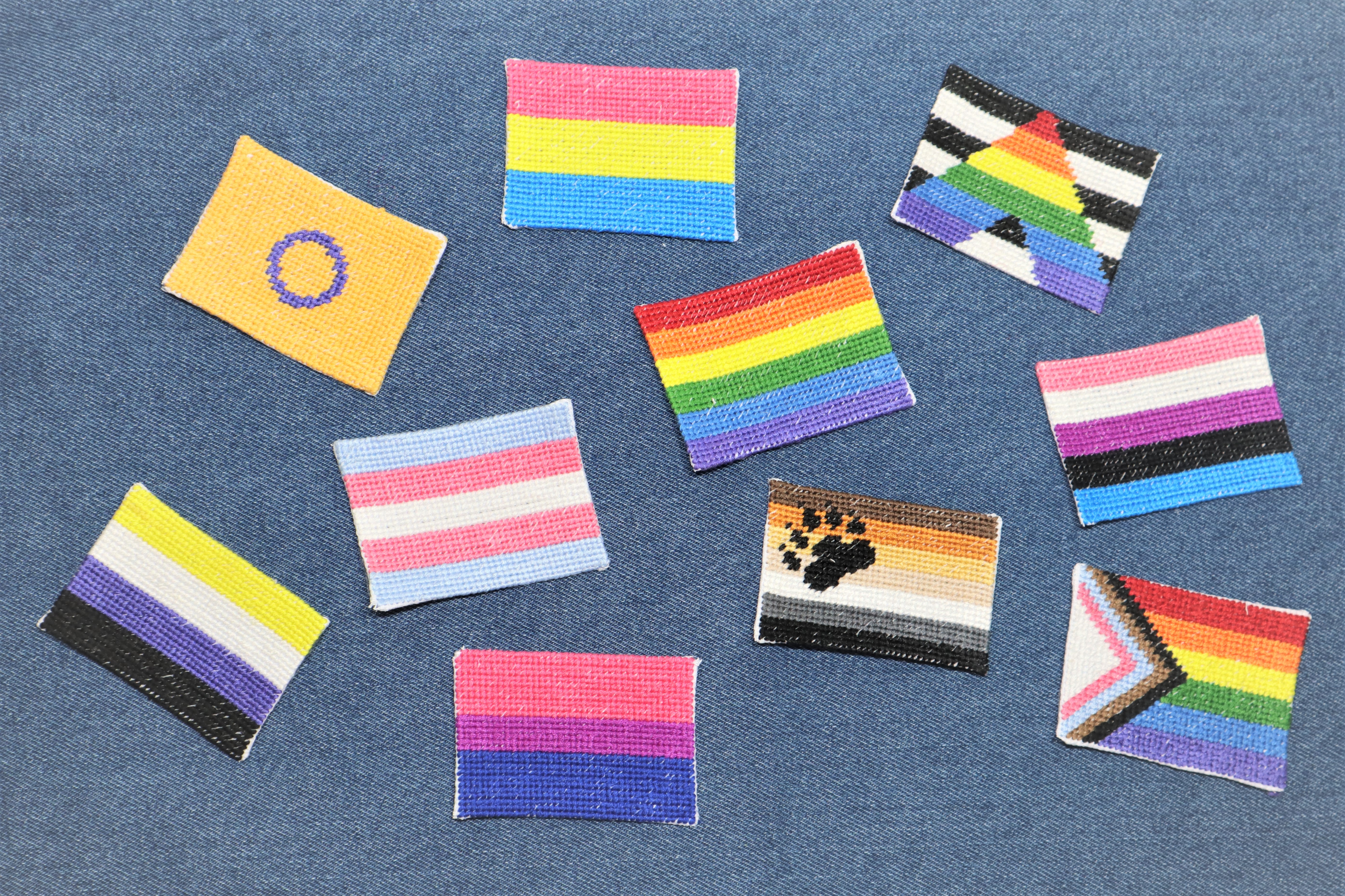 LGBTQIA+ Flag Patches on denim fabric