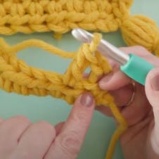 working a double crochet into second stitch
