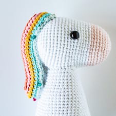 Attaching crochet rainbow mane to amigurumi unicorn 