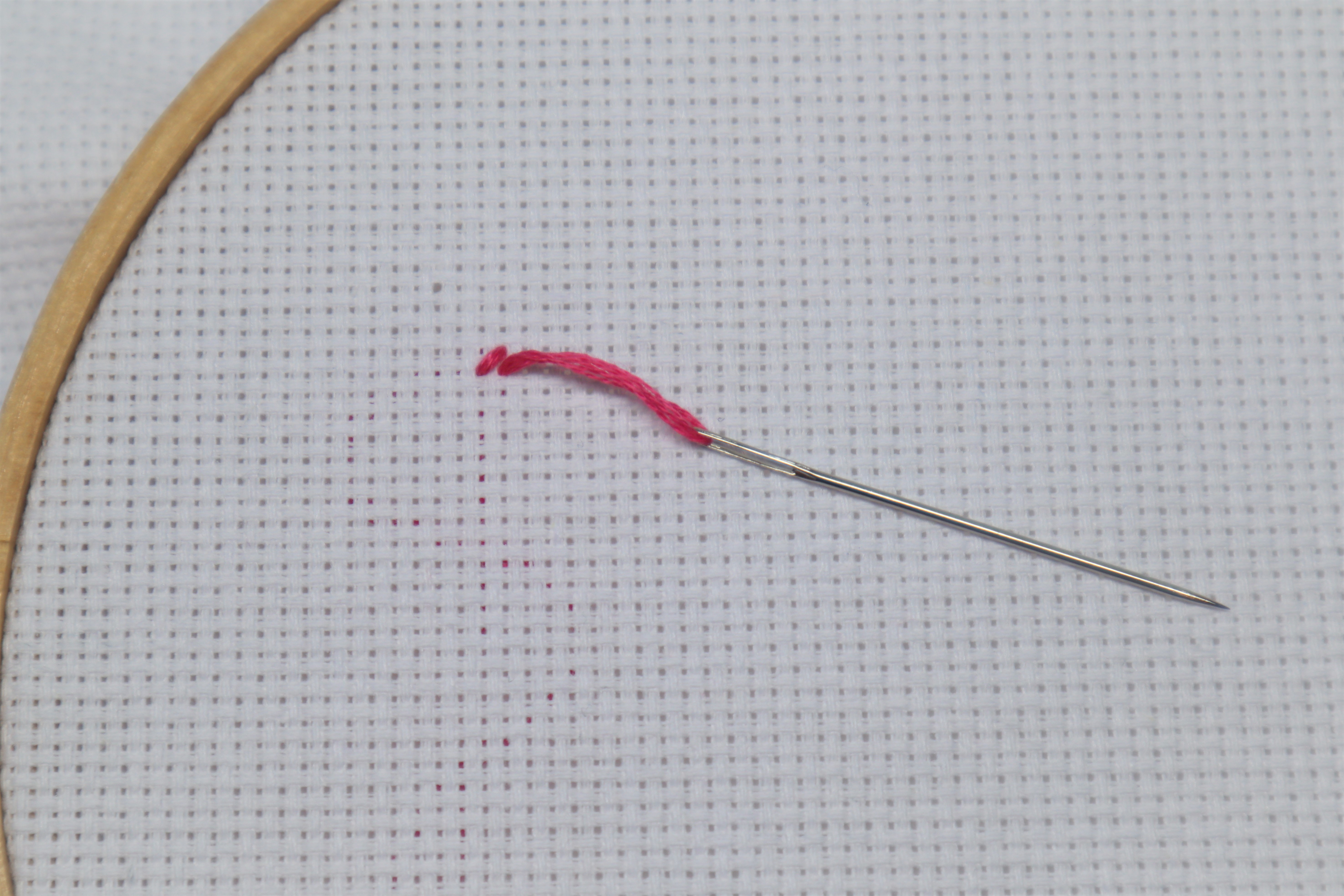 Needle finishing second stitch