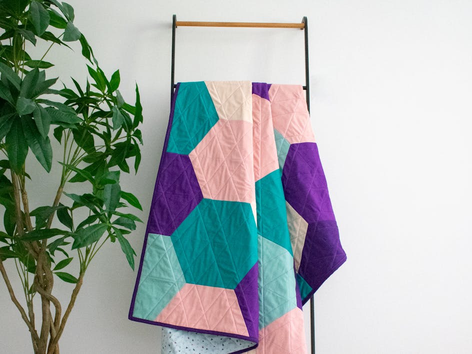 Learn how to make a hexagon quilt with our tutorial