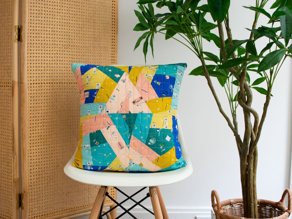 Learn how to make a crazy quilt cushion with this tutorial!