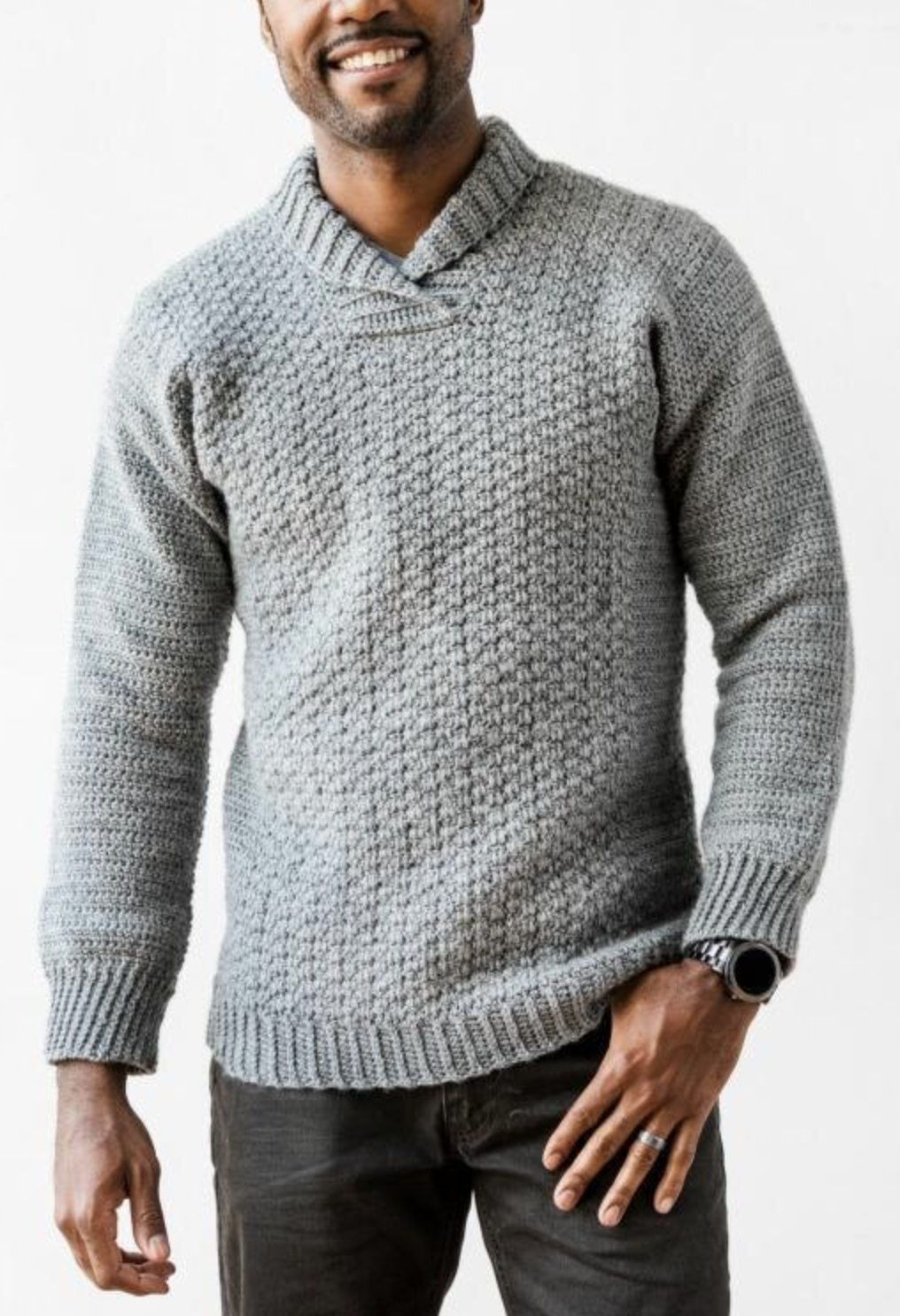 Man wearing a light grey crochet sweater with a nice collar