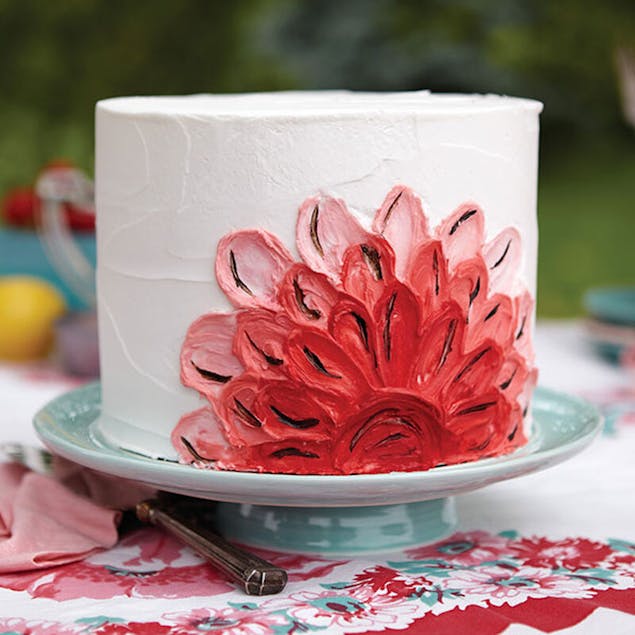 White round cake with painted-effect gradient petals