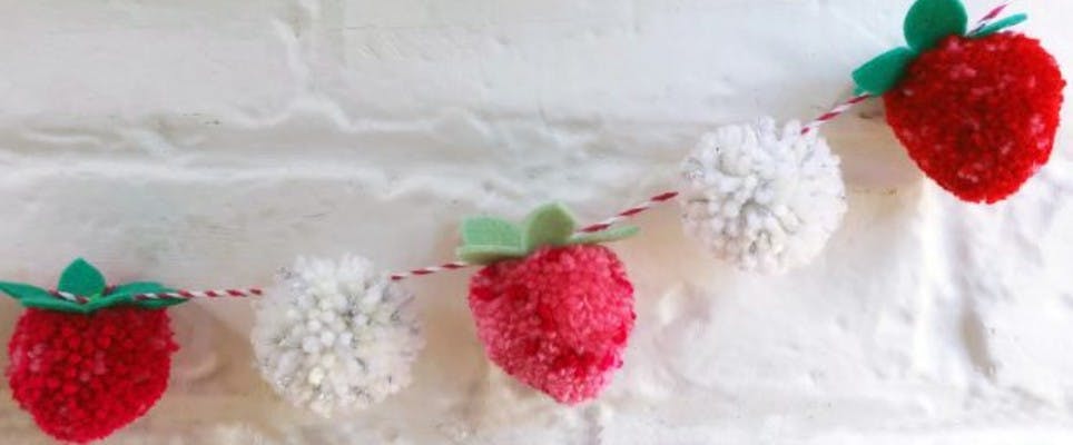 Make a strawberries & cream pom pom garland